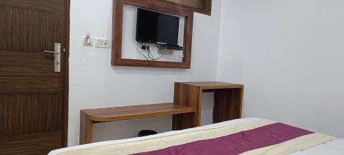 TV a/nebo společenská místnost v ubytování Hotel A10