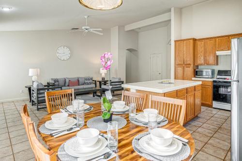 a kitchen and dining room with a table and chairs at 17 Mi to Napa Spacious Vallejo Family Home! in Vallejo