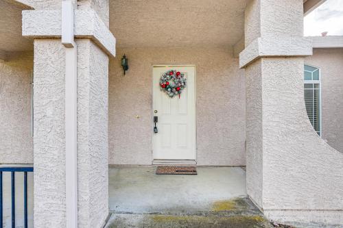 a house with a white door with a wreath on it at 17 Mi to Napa Spacious Vallejo Family Home! in Vallejo