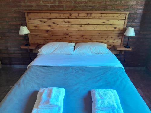 Cama o camas de una habitación en Acacias