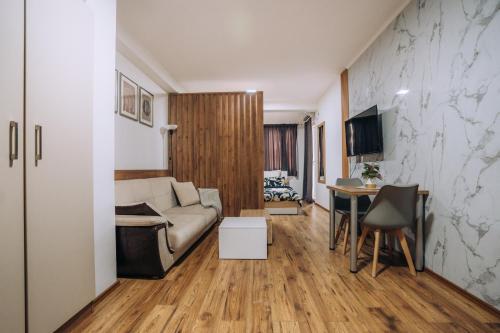 Μια τηλεόραση ή/και κέντρο ψυχαγωγίας στο SANA Apartments