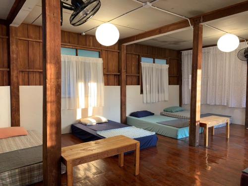 Postel nebo postele na pokoji v ubytování Ka Prao Kai Hostel
