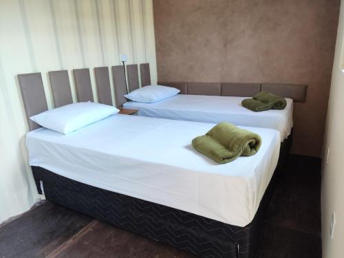 Postel nebo postele na pokoji v ubytování Pousada Dona Chica