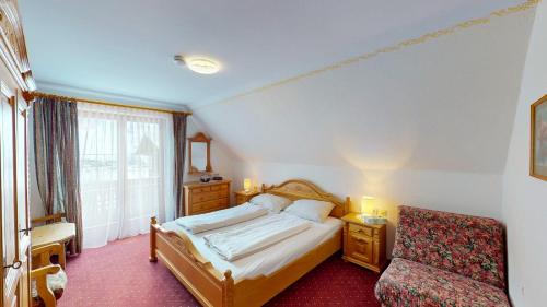 Postel nebo postele na pokoji v ubytování Bräuhaus Appartements