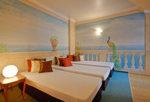Posteľ alebo postele v izbe v ubytovaní Wohlfühlhotel Goiserer Mühle