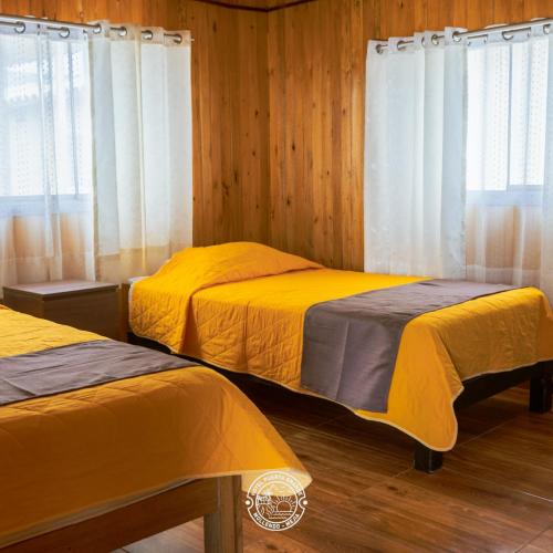 En eller flere senge i et værelse på Hotel Puerta Grande Mejía Mollendo