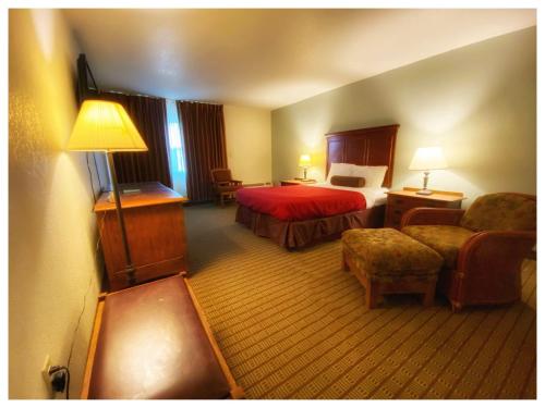 Katil atau katil-katil dalam bilik di Galesburg Extended Stay