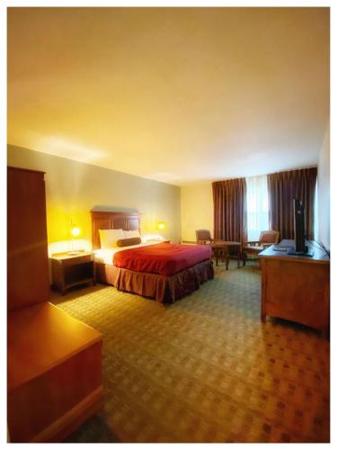 Katil atau katil-katil dalam bilik di Galesburg Extended Stay
