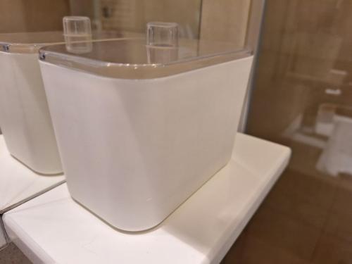 a close up of a toilet in a bathroom at RIVIJERA CITY in Belgrade