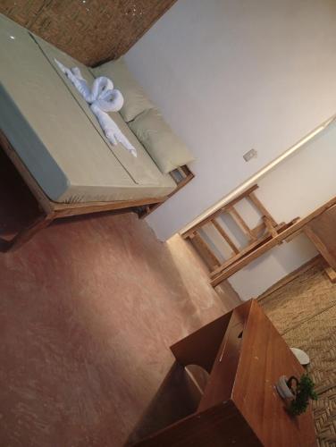 an overhead view of a room with a couch and a table at El Hermosa Beach Resort in El Nido
