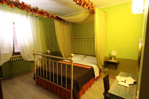 Tempat tidur dalam kamar di Podere Osteria