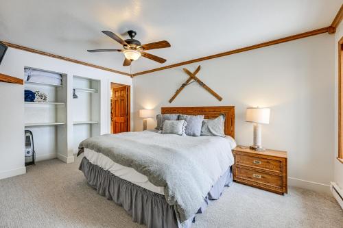 a bedroom with a bed and a ceiling fan at Brian Head Condo with Pool Access - Steps to Resort! in Brian Head