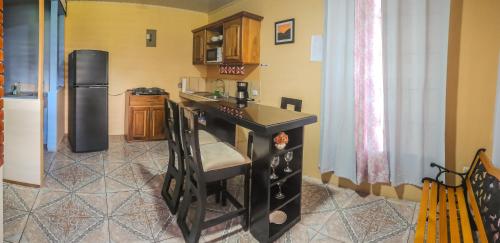Kuchyň nebo kuchyňský kout v ubytování Apartamento Daly #1