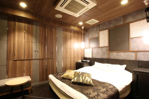 Postel nebo postele na pokoji v ubytování Hotel K Omiya (Adult Only)