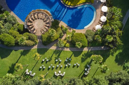 an aerial view of a resort with a pool at Mandarin Oriental, Santiago in Santiago
