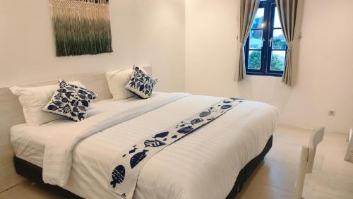Postel nebo postele na pokoji v ubytování Little Mykonos