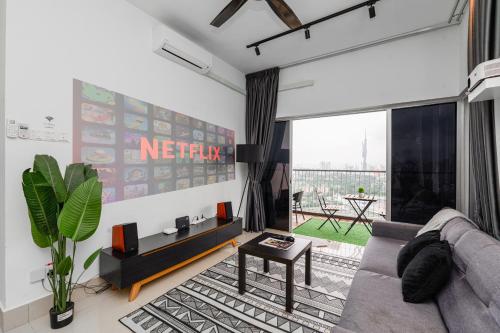 a living room with a couch and a table at Razak City Residence by Lisa Homestay in Kuala Lumpur