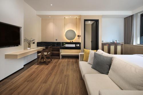 Χώρος καθιστικού στο Riverbank Hotel