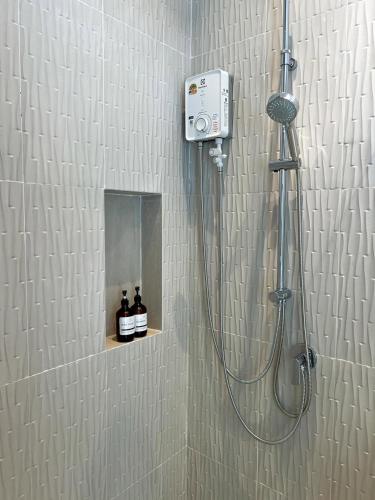a shower in a bathroom with a shower at Siam Beach Resort Koh Kood in Ko Kood