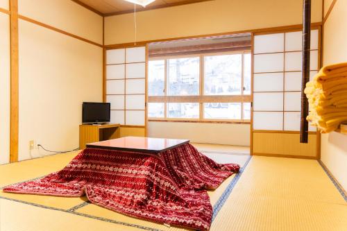 TV a/nebo společenská místnost v ubytování Hotel GOOD DAY Yuzawa