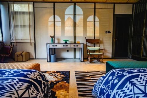 a living room with a couch and a table at Sanya Yalong Bay Danqiu Castle Manor Hotel in Sanya