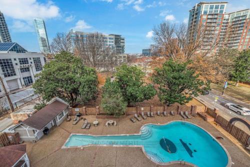 an overhead view of a swimming pool with chairs and a large guitar at Honky Tonk Angels Suite in Nashville