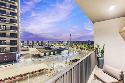 a balcony with a view of a building at Luxury 1BR City View with Balcony Parking & WiFi Near Dining & Downtown in Dubai