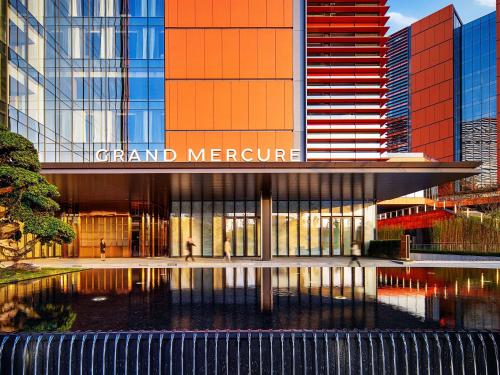 a view of the grand mer centre in a city at Grand Mercure Chengdu East in Chengdu