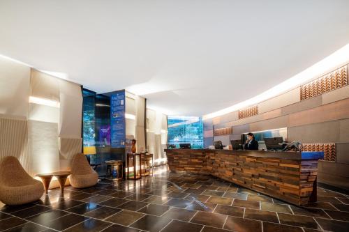 Ein Sitzbereich in der Unterkunft The Mulian Hotel Guangzhou Zhujiang New Town-Canton Fair Free Shuttle Bus