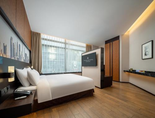 TV/Unterhaltungsangebot in der Unterkunft The Mulian Hotel Guangzhou Zhujiang New Town-Canton Fair Free Shuttle Bus