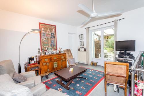 TV a/nebo společenská místnost v ubytování Appartement City Garden - Welkeys