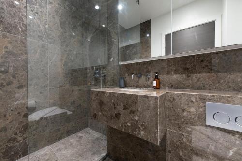 a bathroom with a sink and a shower at City Escape - Stylish Studio in Central Reading - CHRL F16 in Reading