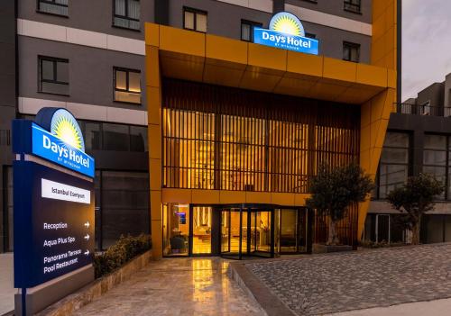 a building with a sign on the front of it at Days Inn & Suites by Wyndham Esenyurt in Istanbul
