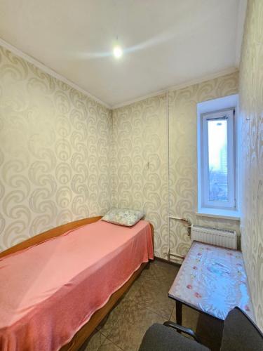 Кровать или кровати в номере 3 кімнатна квартира. Центр. Бульвар Шевченка