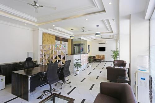 an office with a table and chairs in a room at HOTEL SHYAM INTERNATIONAL - NEAR TERMINAL 3 DELHI AIRPORT WITH - Free AIRPORT PICKUP in New Delhi