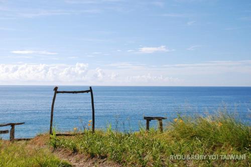 a view of the ocean from the top of a hill at Sea Princess B&B in Fengbin