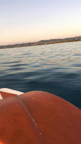 a view of the bow of a boat in the water at Valamar Sea View Apartment in Hamallë