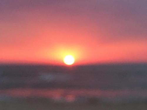a sunset with the sun in the sky at Valamar Sea View Apartment in Hamallë