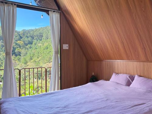 Ένα ή περισσότερα κρεβάτια σε δωμάτιο στο Harumi Home Dalat