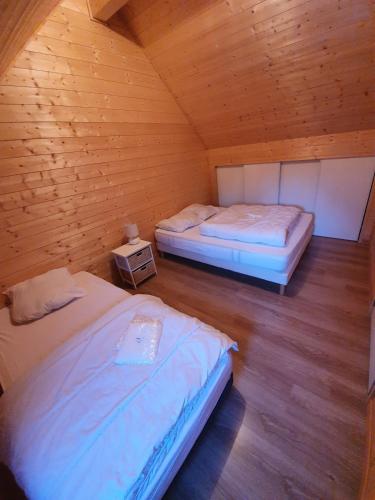 Ένα ή περισσότερα κρεβάτια σε δωμάτιο στο Chalet ARREAU