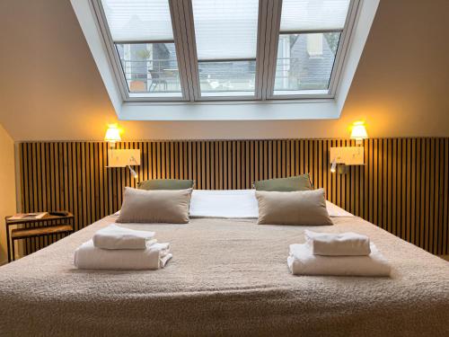 Katil atau katil-katil dalam bilik di La Maison Régent & spa - Plage de la Baule