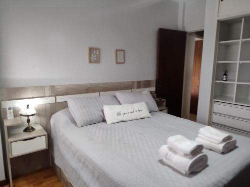 Postel nebo postele na pokoji v ubytování Céntrico, amplio y luminoso