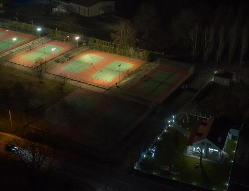 an overhead view of two tennis courts at night at Tennis Home-Pozar, Piperia! in Áno Rodoniá