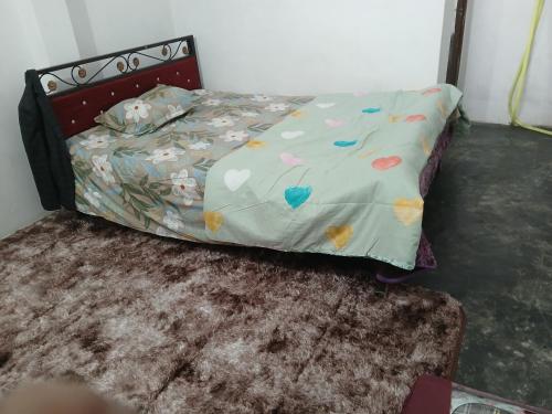 Postel nebo postele na pokoji v ubytování Meraaj Guest House