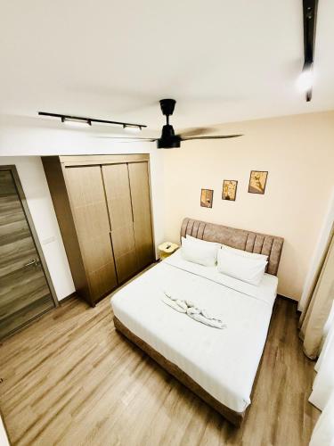 Ένα ή περισσότερα κρεβάτια σε δωμάτιο στο Agile Dream House Bukit Bintang TRX