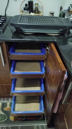 a set of stairs under a desk at Serene Haven Villa in Batapola
