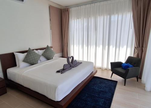 Ένα ή περισσότερα κρεβάτια σε δωμάτιο στο Seava House Ao-Nang Krabi