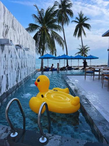 a rubber duck in a swimming pool at a resort at Three Trees Samui Resort - Sarocha Villa in Lamai