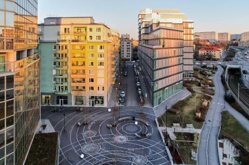a view of a street in a city with buildings at The Pink Patio - Cozy Modern Private Apartment in Solna