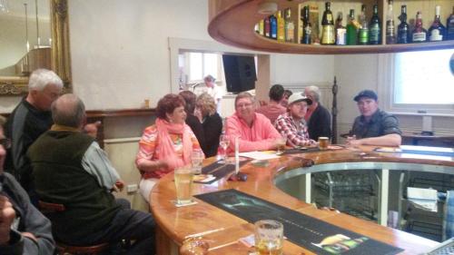 a group of people sitting at a bar at The Empire Hotel Deloraine in Deloraine